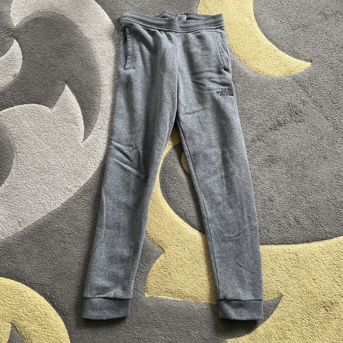 North face grey jogging - face,